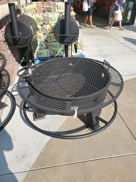 Cook your food over a real wood <strong>fire</strong> or use the porcelain coated charcoal pan for more a controlled cook. . Buc ees fire pit
